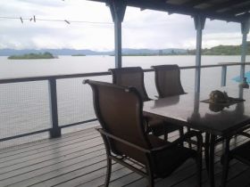 Dining on the balcony on Split Hill home, Bocas del Toro, Panama – Best Places In The World To Retire – International Living